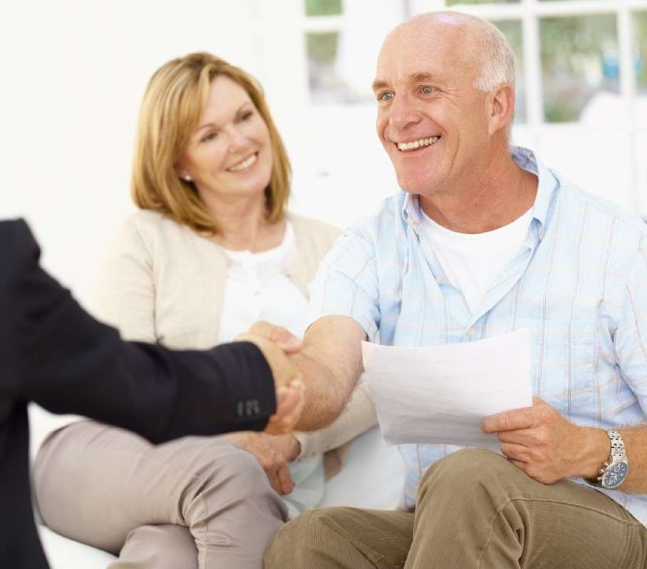 A couple consulting with an advisor