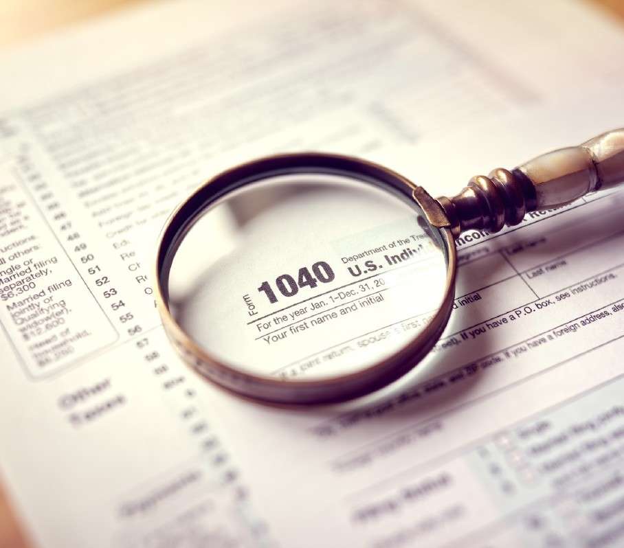 Tax preparation documents and calculator