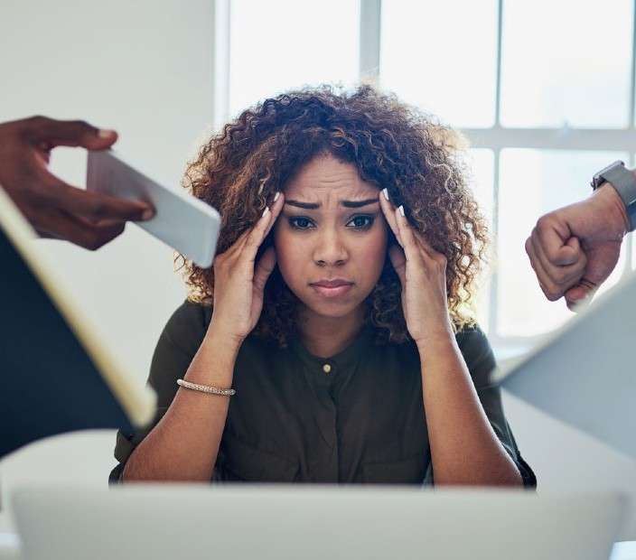 Stressed person with tax documents