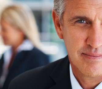 People reviewing payroll documents
